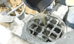 Pouring Floor Screed into the Screed Pump